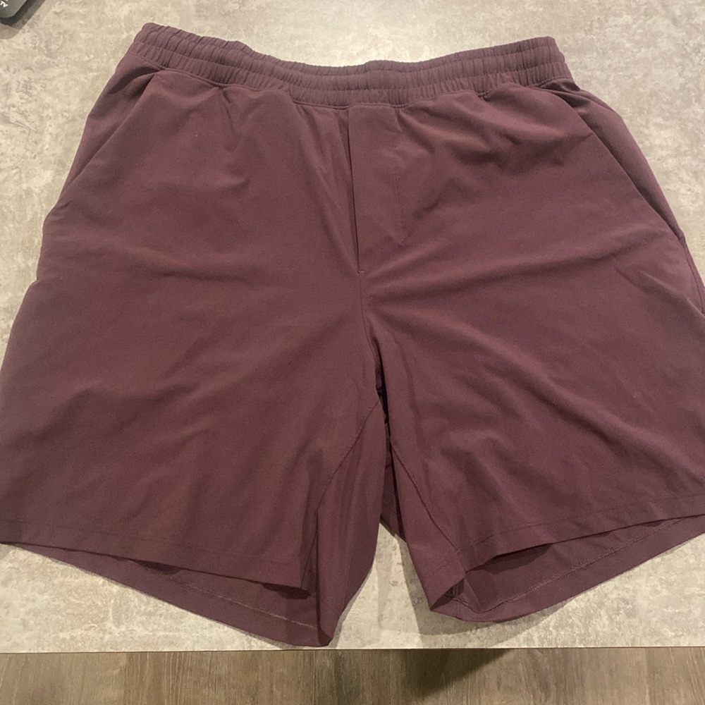 Lulu Pacebreaker Purple 
- Liner Cut Out 
- Size Large 7” Inseam